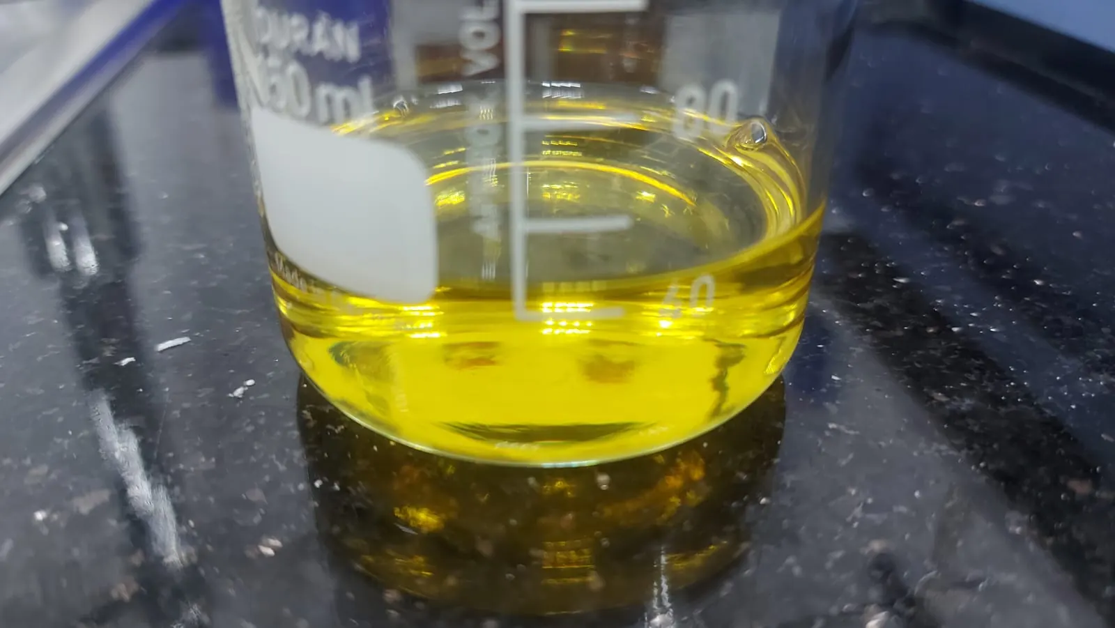 Glycol clearing to yellow in a Duran beaker
